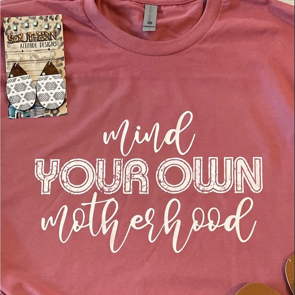 Unisex T-Shirt. “Mind your own motherhood”